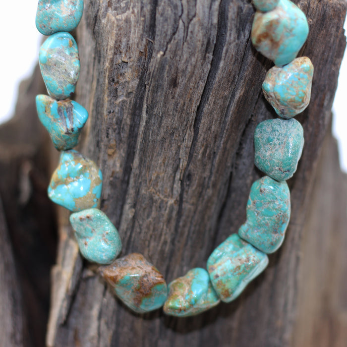 (TURQ-111) Turquoise nugget bead strand.