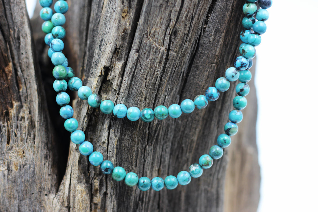 (Turq 109)  6mm. Round Turquoise beads