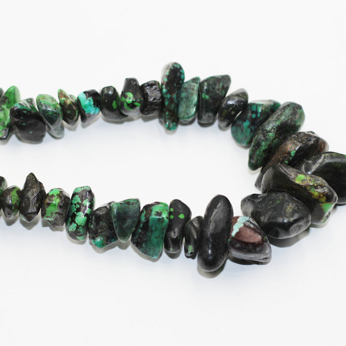 (Turq 110) Graduated Turquoise chunky bead strand.