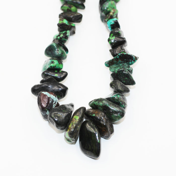 (Turq 110) Graduated Turquoise chunky bead strand.