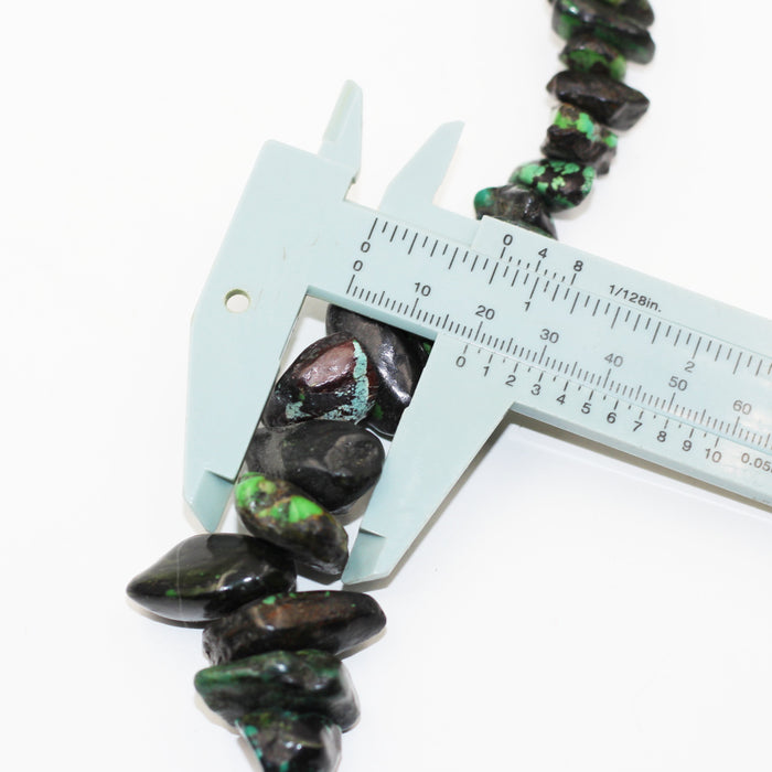 (Turq 110) Graduated Turquoise chunky bead strand.