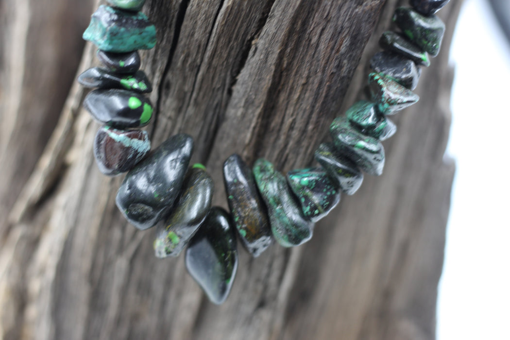 (Turq 110) Graduated Turquoise chunky bead strand.