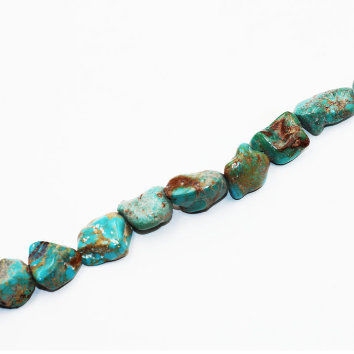 (TURQ-111) Turquoise nugget bead strand.
