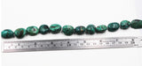 Turq 112   Turquoise spider web nuggets bead strand.