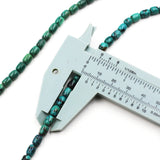 Turq 113   Turquoise barrel shaped bead strand.
