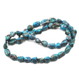 (turq114) Turquoise nugget bead strand.