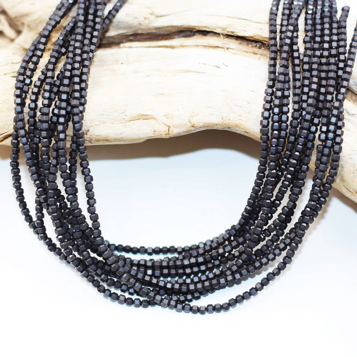 Hem 010  Hematite 3 mm Faceted Octagon Beads