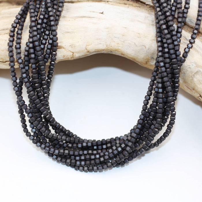 Hem 010  Hematite 3 mm Faceted Octagon Beads