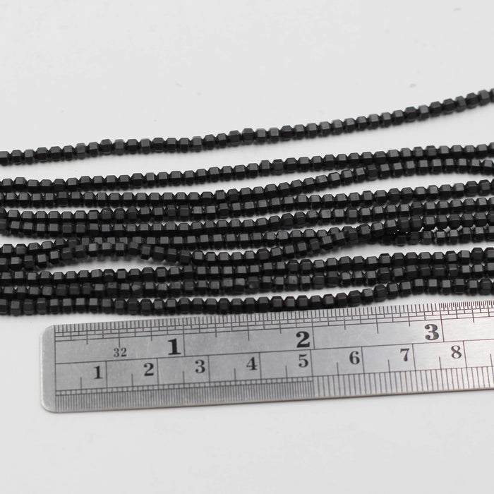 Hem 010  Hematite 3 mm Faceted Octagon Beads