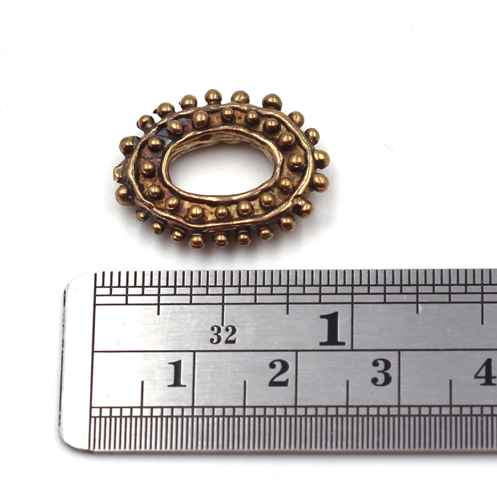 Dotted Oval Bronze Link