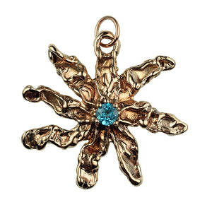 Hand Cast 8 Point Bronze Free Form Star Pendant With Faceted Blue Topaz Stone