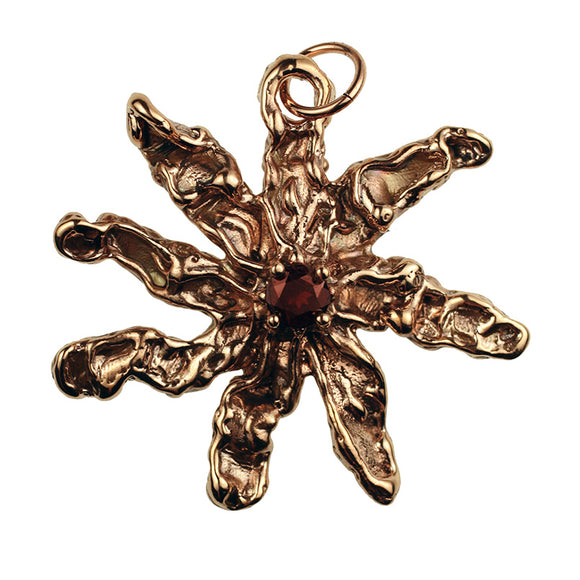 Hand Cast 8 Point Bronze Free Form Star Pendant With Faceted Garnet Stone