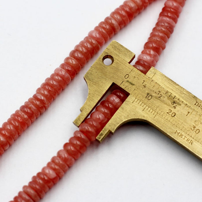 (rho002) 7mm. Rhodocrosite 7 mm.smooth rondelles