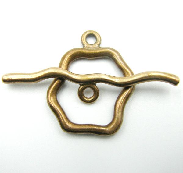 (bzct031-8842) Bronze smooth sculpted toggle clasp.