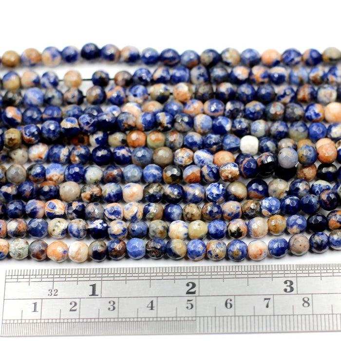 (soda006)  Faceted 6mm Blue Denim Sodalite beads .
