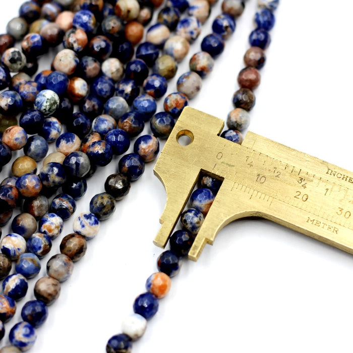 (soda006)  Faceted 6mm Blue Denim Sodalite beads .