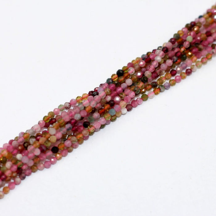 (Tour008)  2 mm round multi faceted multi-color Tourmaline beads.