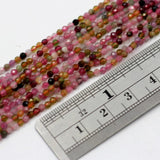 (Tour008)  2 mm round multi faceted multi-color Tourmaline beads.