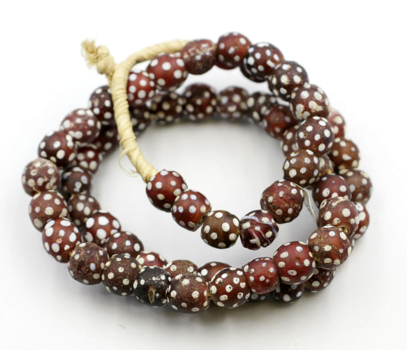 Very Collectible Red & White Skunk Beads.