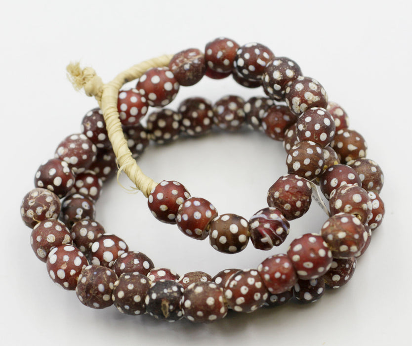 Very Collectible Red & White Skunk Beads.