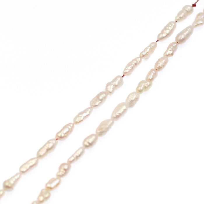 (fwp041) 4x10mm Baroque Pinked Fresh Water Pearls