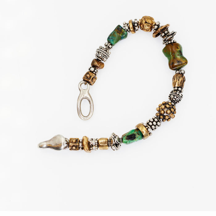 Silver and Bronze Bracelet with Turquoise nuggets.