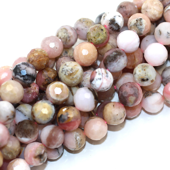 A string of faceted round pink Peruvian opal beads.