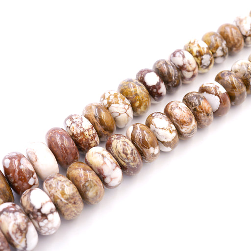 A series of graduated wild horse jasper beads on a strand, varying in color and size.